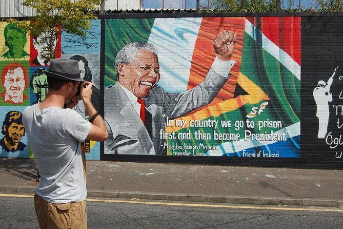 Belfast history of terror & mural 1 hr express private taxi tour - Stop 5: The International Mural Wall on Divis Street