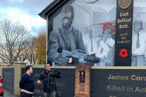 The Troubles and iconic award winning taxi 2hr private cab tour - Stop 2: Divis Flats and the start of the Falls Road murals
