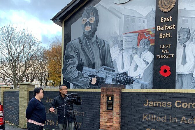 The Troubles and iconic award winning taxi 2hr private cab tour - Stop 2: Divis Flats and the start of the Falls Road murals